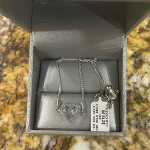 Zales diamond heart bracelet. Never worn- has tags